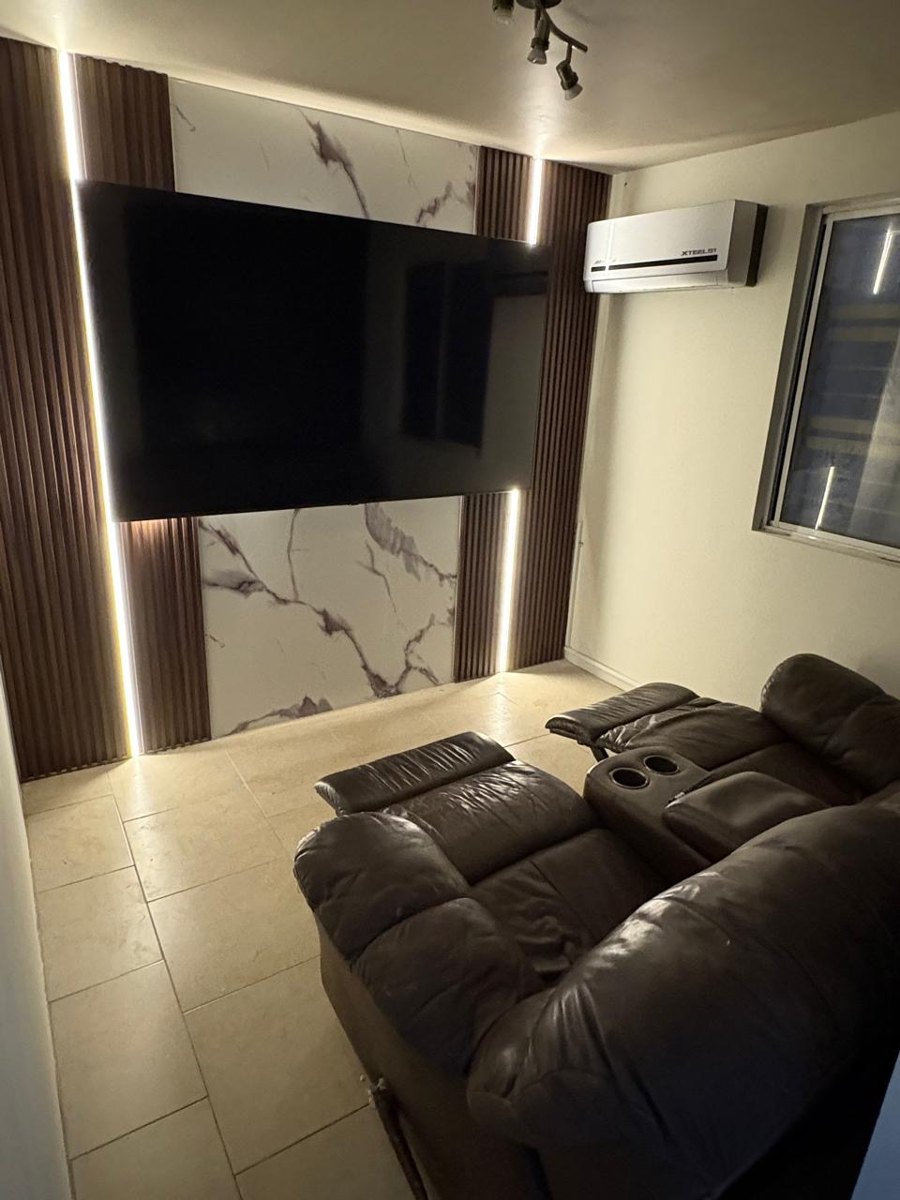 Muro para televisión con iluminación